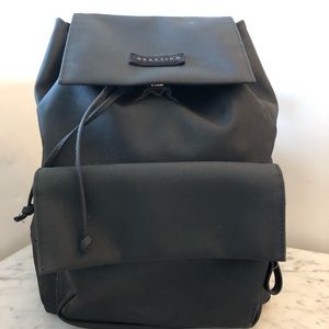Black Kenneth Cole Reaction back pack.